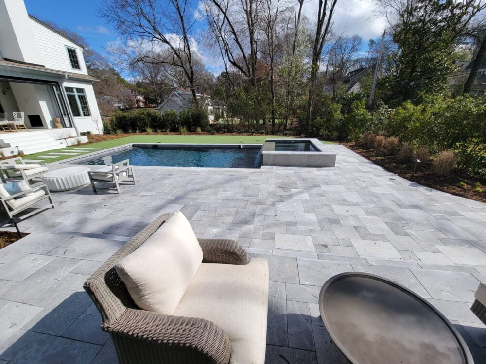 Stylish Pool Design with Savannah Gray Pavers from Noda Stone