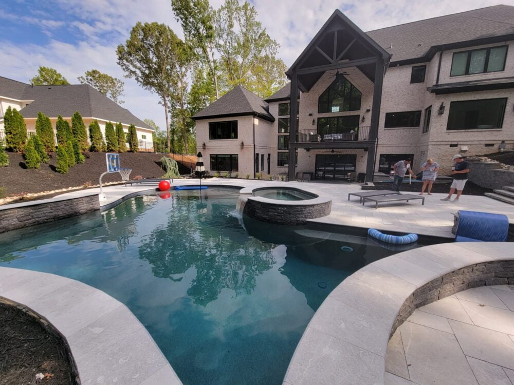 Savannah Gray Pavers in Elegant Outdoor Pool Project by Noda Stone