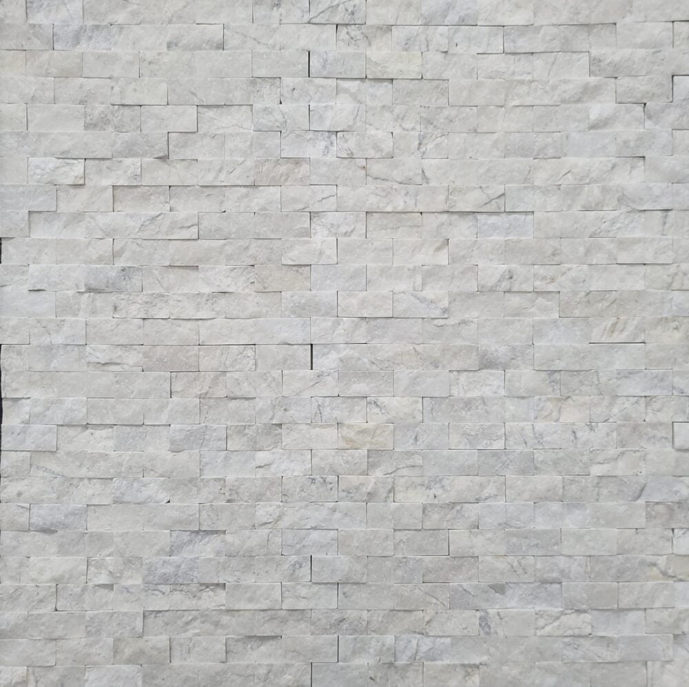 Carrara 1x2 Split Face Wall Covering by Noda Stone.