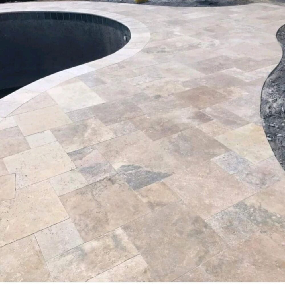 Outdoor setting showcasing Country Classic Travertine by Noda Stone Inc.