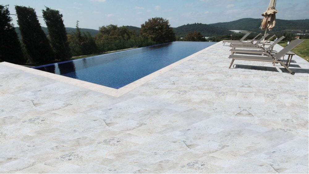 Outdoor setting showcasing Silver Latte Pavers by Noda Stone.