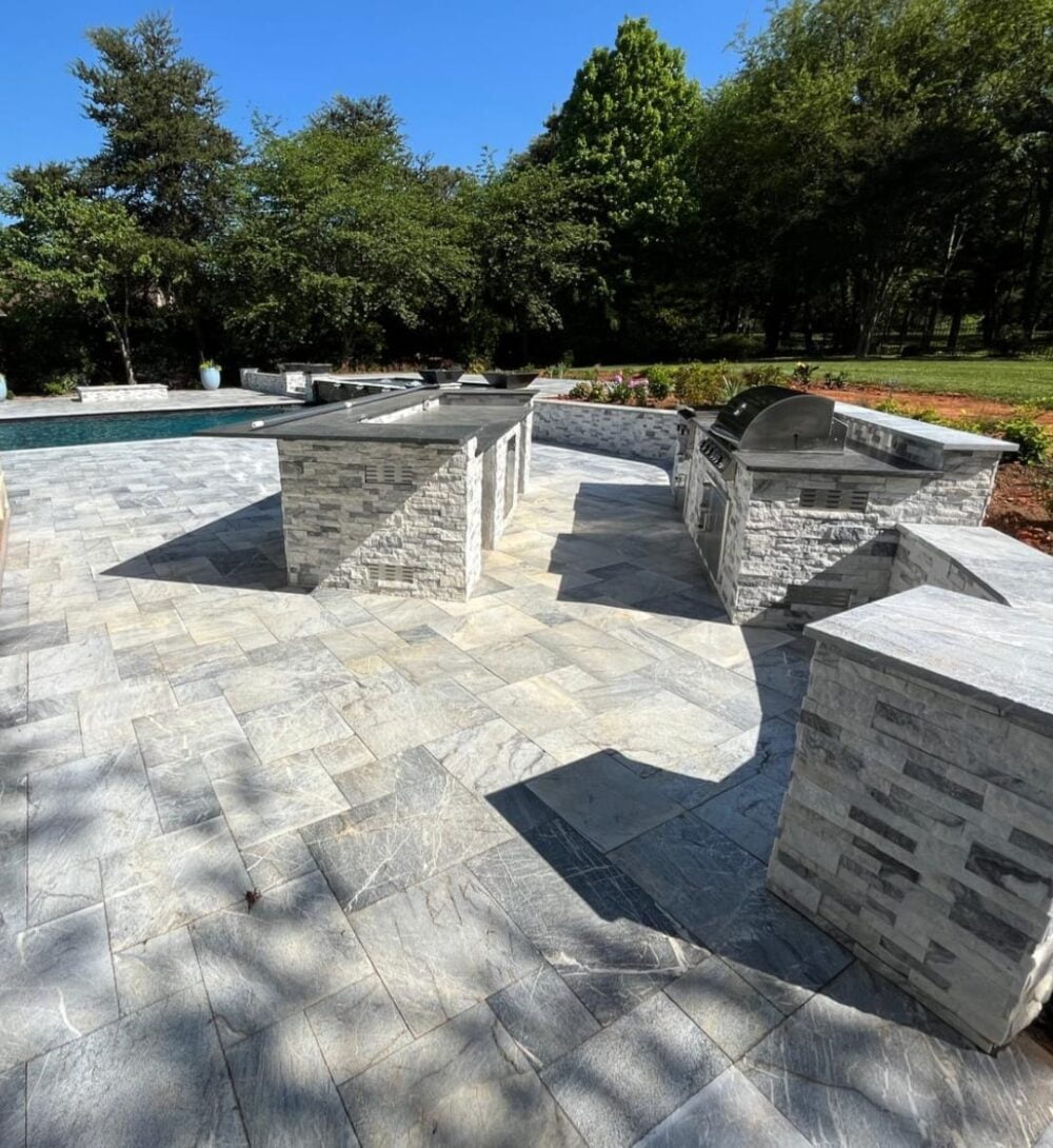 Patio design using Silvermoz Leather Finished Pavers from Noda Stone Inc