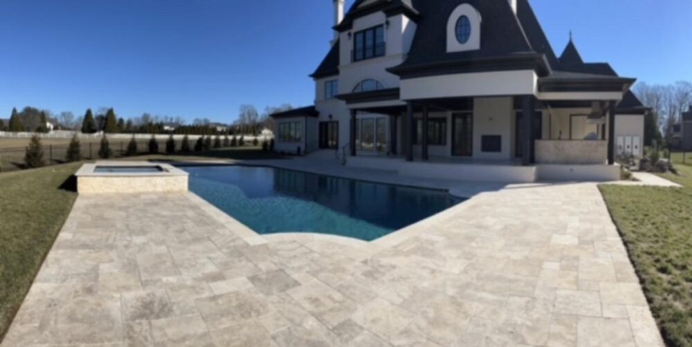 Elegant setting showcasing Walnut Travertine by Noda Stone Inc.